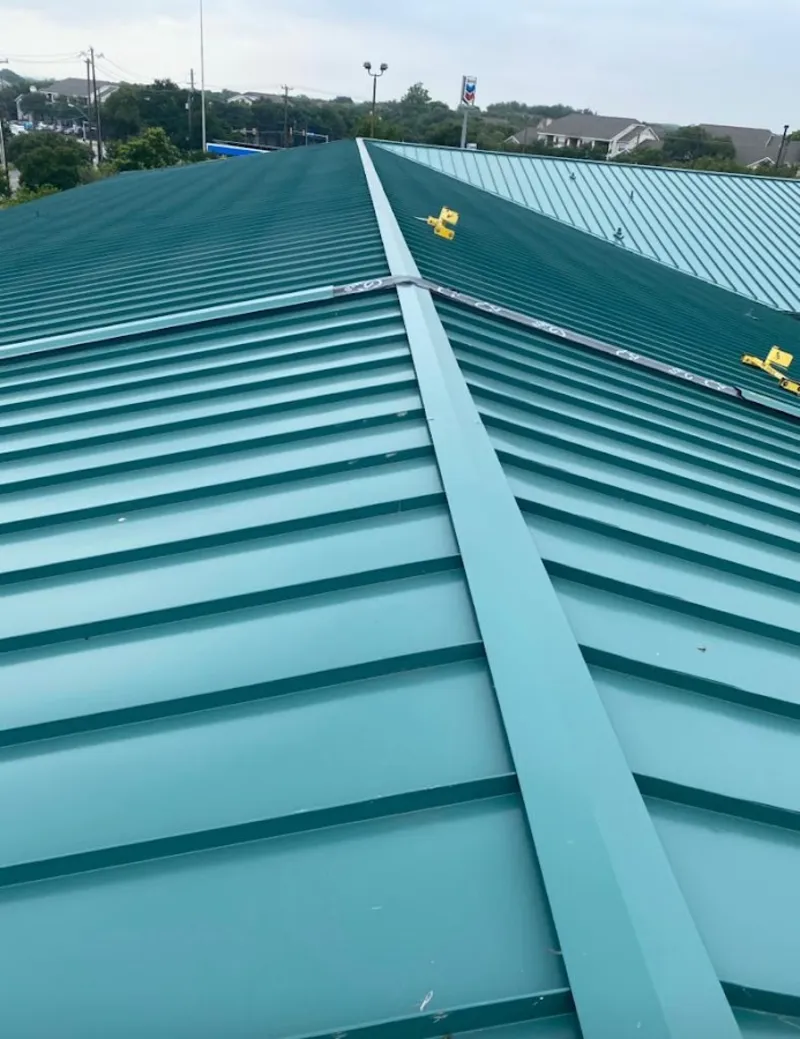 Green commercial metal roof ridge and valley for Metal Roof Repair in Airway Heights